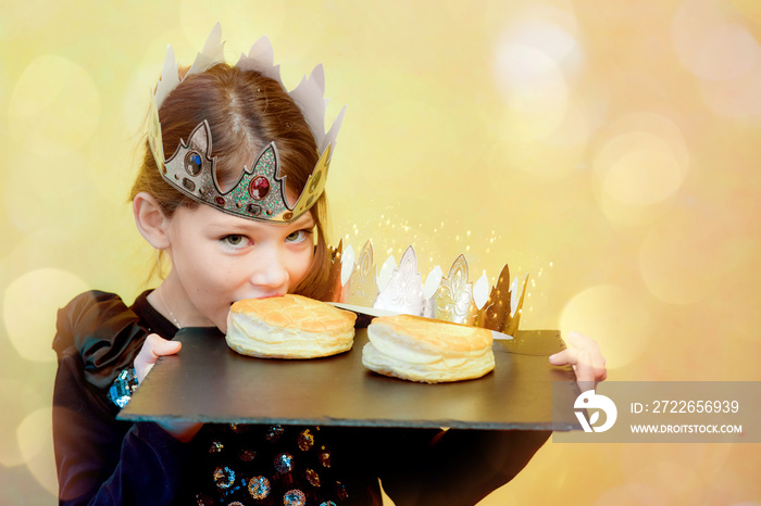 pretty little girl and her cake for the epiphany