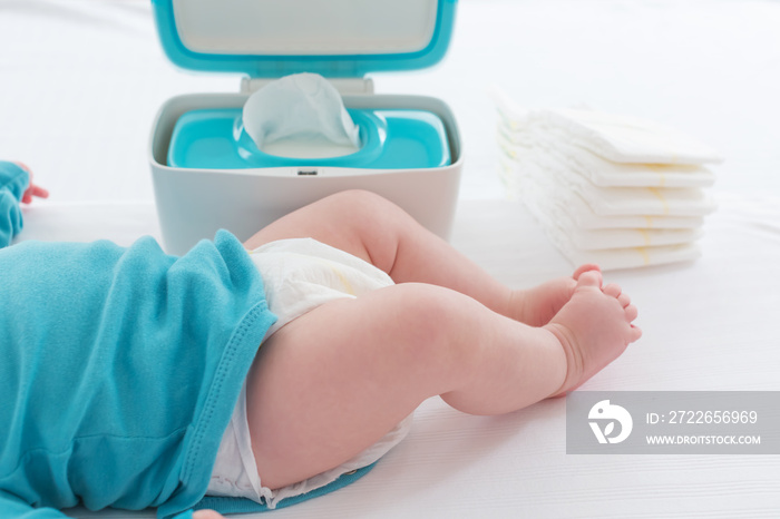 Little baby boy preparing for a diaper change