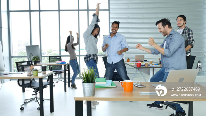 Office teamwork celebration working happiness Happy business people dance expression together at office after job done complete in meeting room. Diversity people happy moment dance together in company