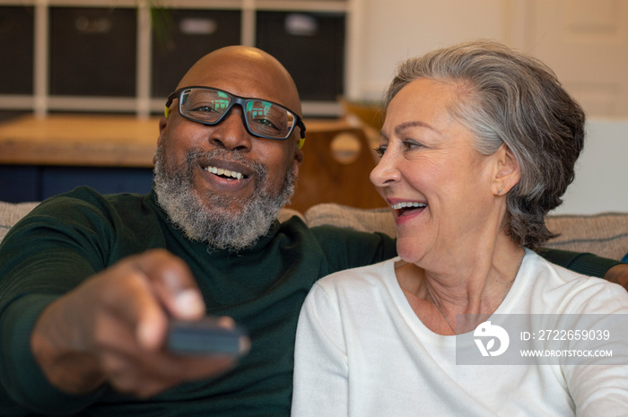 Senior couple relaxing at home