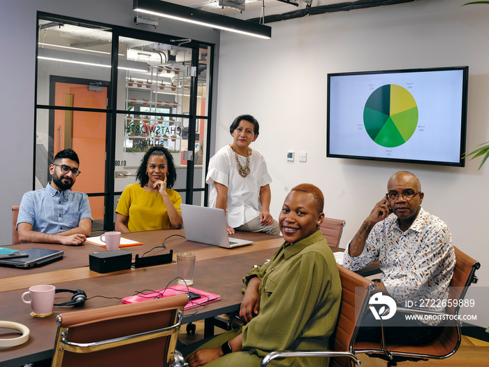 Group portrait of people at business meeting