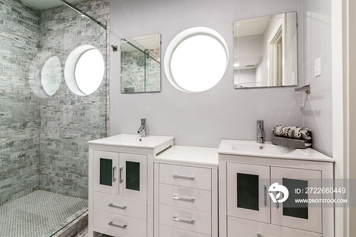 Eye-Level, angle view, Modern White and Grey Bathroom with Round windows