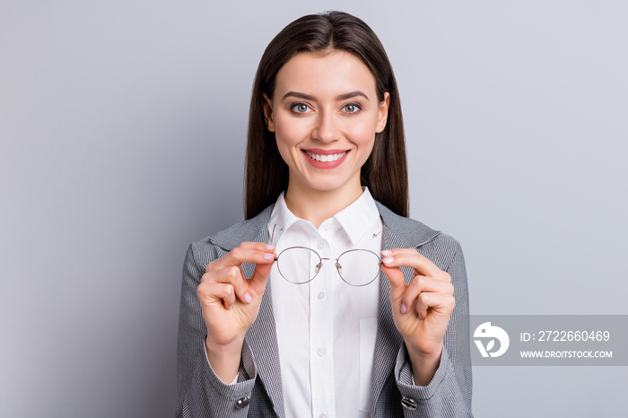 Closeup photo of attractive business lady perfect appearance beaming smiling taking off specs good eyesight after laser operation wear white shirt plaid blazer isolated grey color background