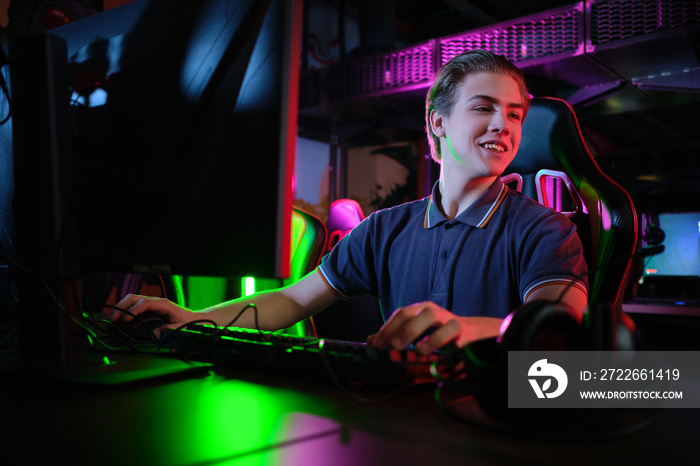 Cyber sport. Team play. Professional cybersport player training or playing online game on his PC