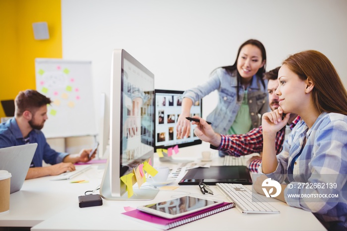 Business people working with computers