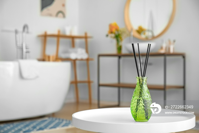 Reed diffuser in modern bathroom