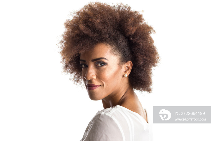 afro hair black brazilian girl sideways feeling happy and carefree. Standing against white background. Isolated on white background.