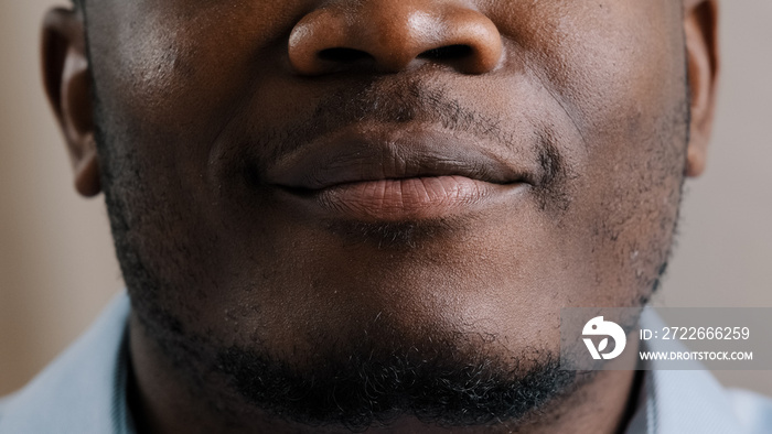 Extreme close up happy male smiling face african american young man positive male model ethnic guy smile toothy with white healthy teeth advertisement after stomatological treatment dental procedure