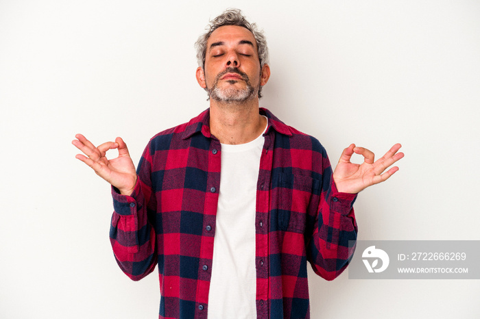 Middle age caucasian man isolated on white background  relaxes after hard working day, she is performing yoga.