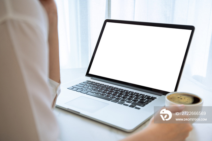 Unrecognizable cheerful Asian woman using laptop computer browsing the internet. Mockup empty screen.