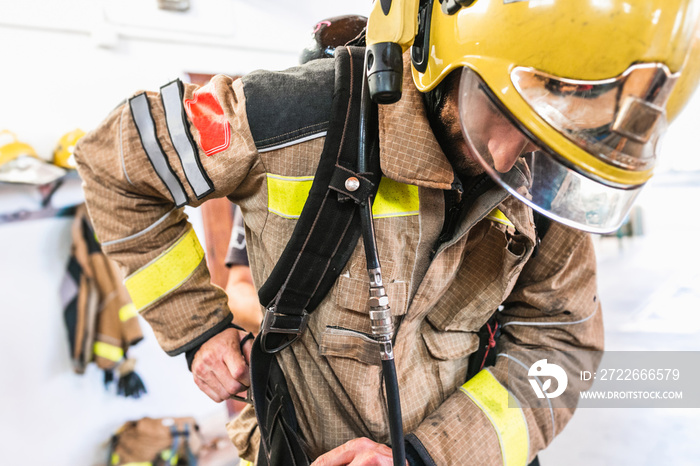 Unrecognizable firefighter equipment