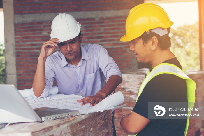 architect and engineer inspect housing estate building to success construction plan before send quality housing to customers ;Showing thumb up for good teamwork .