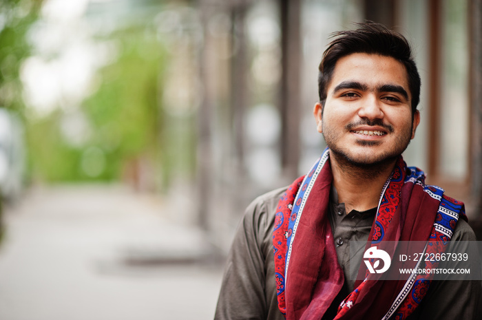 Indo pakistani man wear traditional clothes achkan or sherwani.