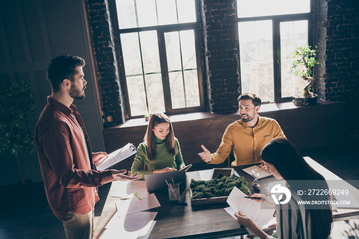 Businesspeople ceo boss chief wearing casual formal-wear listening to company law department HR director attending conference at modern industrial brick loft style interior work place station