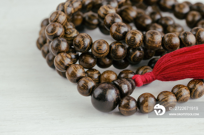 Old wood mala beads, traditionally used in prayer and meditation. Essential accessory for mindfulness or practice yoga.