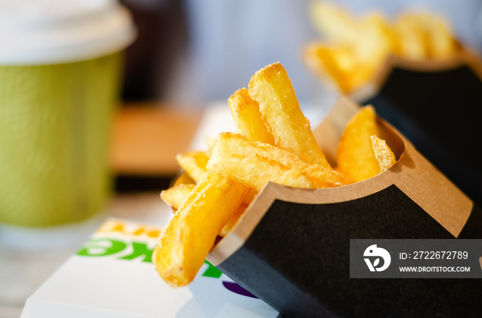 Fried potatoes with salt closeup