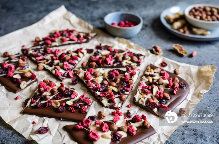 Chocolate bark with hazelnuts, peanuts, cranberries and freeze dried raspberries