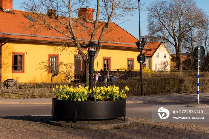 Sandviken, Sweden A traffic circle and potted plants.