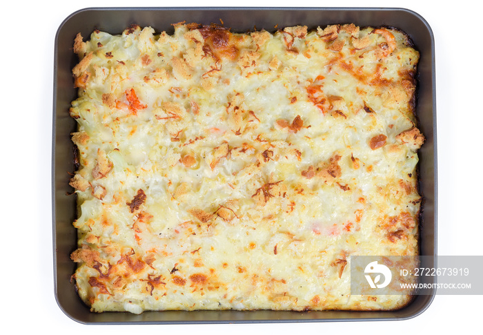 Top view oven tray with cauliflower, cheese and seafood gratin