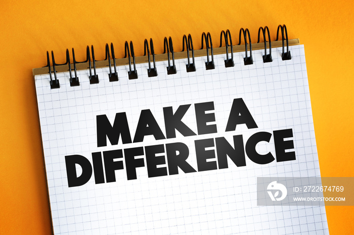 Make A Difference text quote on notepad, concept background