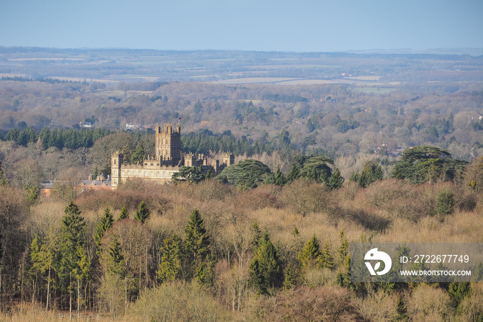 Highclere Castle, the Jacobethan style country seat of the Earl of Carnarvon and location for the period drama television series Downton Abbey, below Beacon Hill, near Newbury, UK