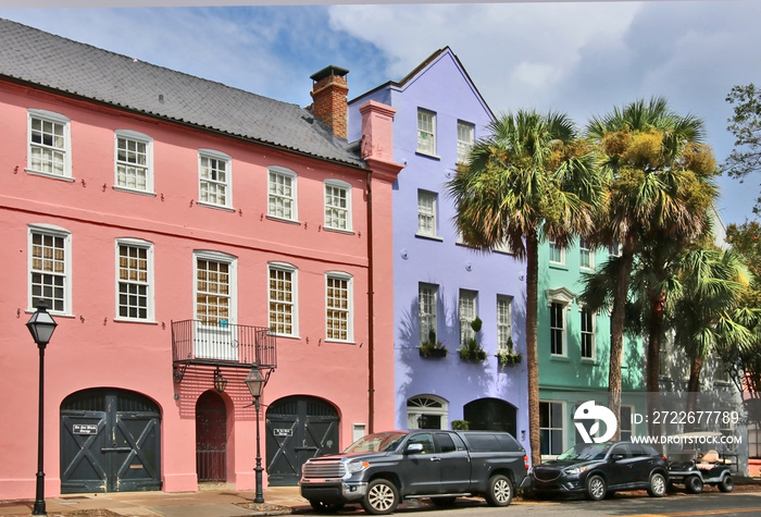Street view with row of colorful buildings in the historic downtown area city of Charleston, South Carolina, USA. Southern style architecture background.