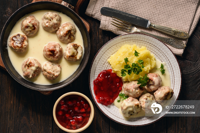 Swedish meatballs  with creamy gravy, mashed potatoes and lingonberry sauce.