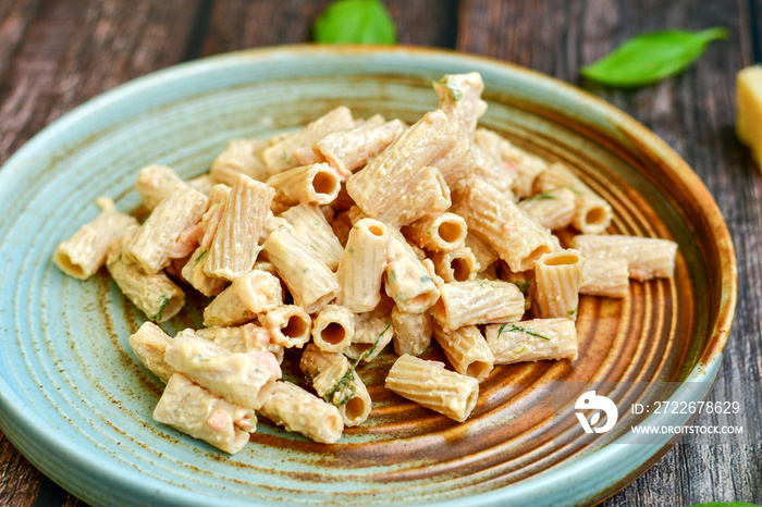 Gluten free Chickpea pasta.Fresh  low carb  high protein pasta rigatoni with  cream sauce  , salmon , parmesan cheese ,olive oil and black pepper)