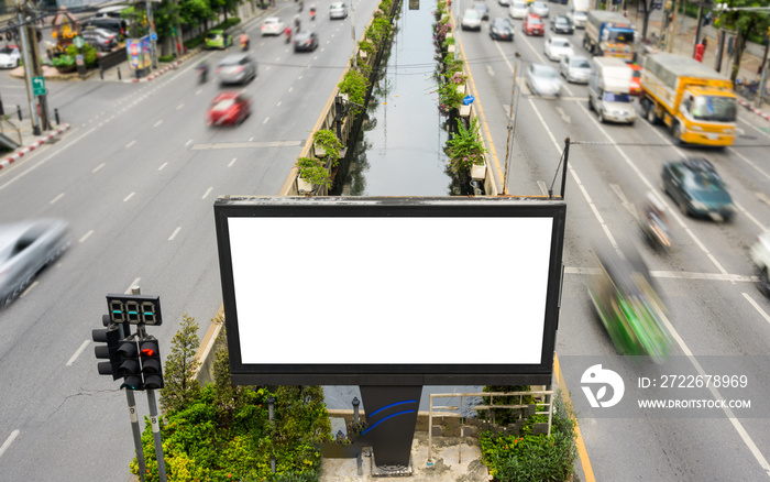 Blank advertisement billboard, mock up, information board with traffic lights  on the street. Advertising concept