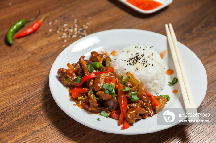 Sweet and Sour Chicken on Rice. Typical Asian dish.