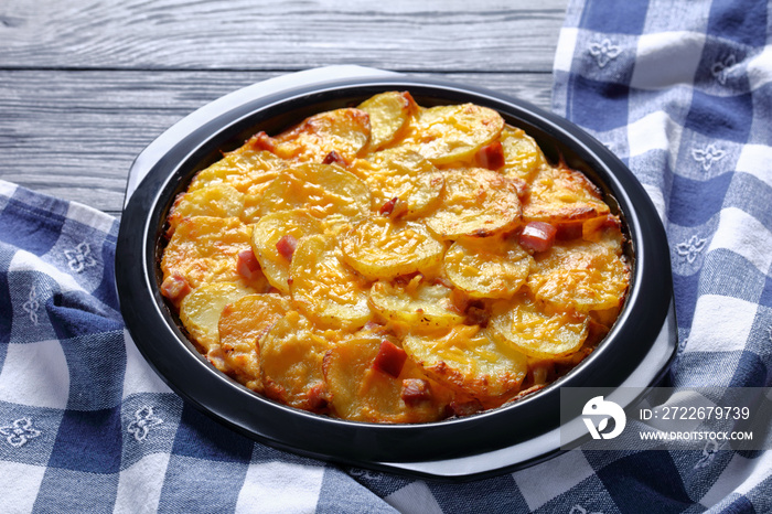 creamy rich scalloped potatoes with ham, top view