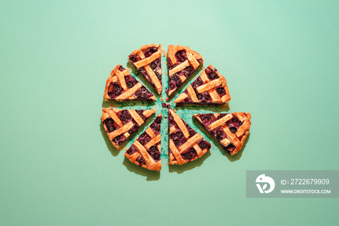 Sliced blueberry pie. Lattice crust cake top view