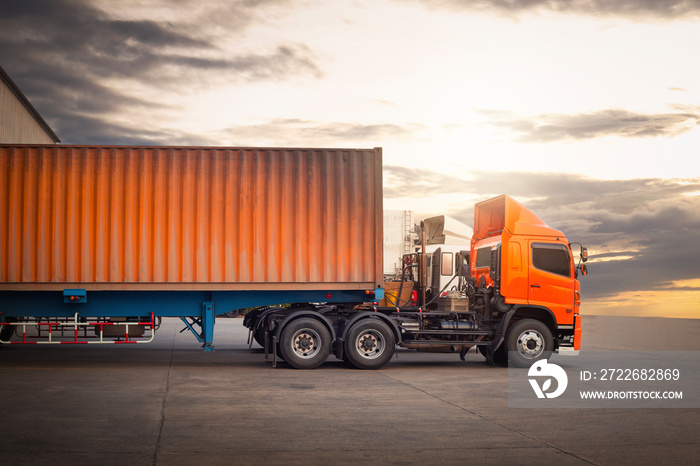 Semi Trailer Trucks on The Parking Lot with The Sunset. Trucks Loading at Dock Warehouse. Shipping Cargo Container. Delivery Trucks, Distribution, Freight Trucks Cargo Transport, Warehouse Logistics.