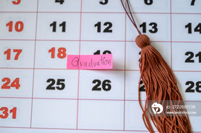 graduation ceremony graduation cap on white clean calendar