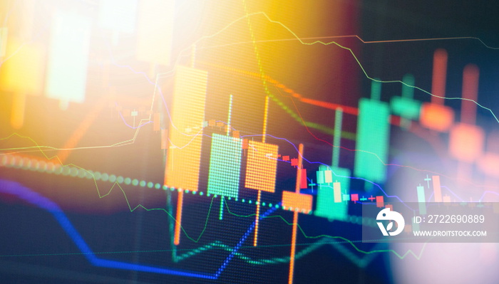 Charts of financial instruments with various type of indicators including volume analysis for professional technical analysis on the monitor of a computer.