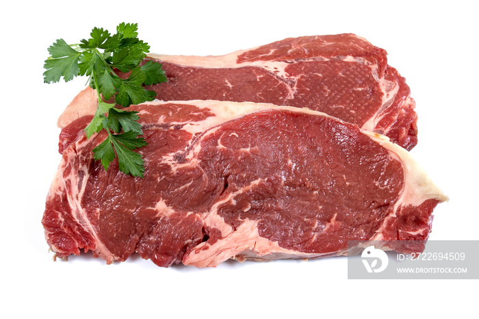 two raw steak on a white background