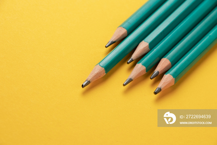 Pencils isolated on yellow background