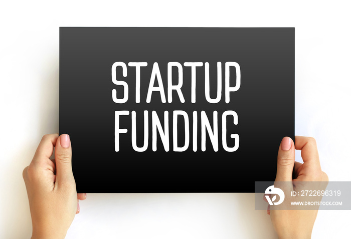 Startup Funding - act of raising capital to support a business venture, text concept on card