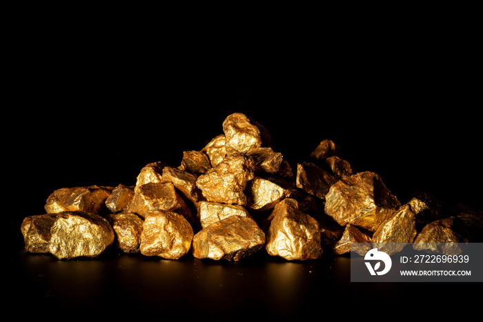 Gold concept, close-up of large gold nuggets