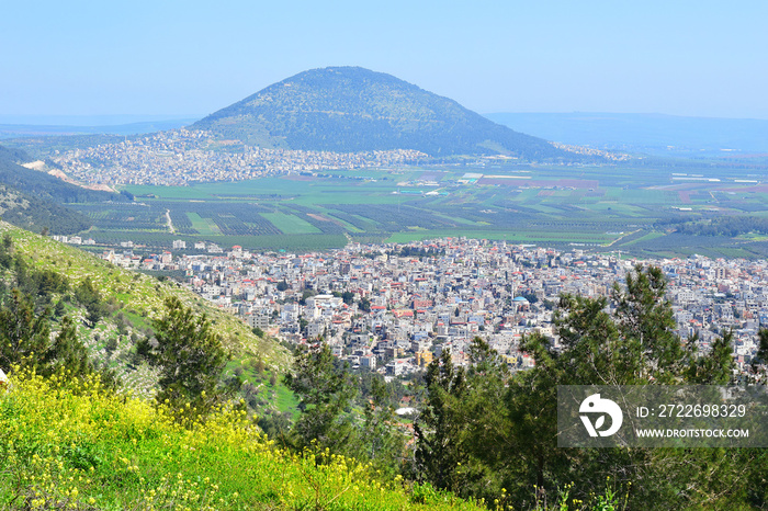 view of the Jezreel Valley, biblical Mount Tabor and the Arab villages at its foot, neighborhood Nazareth, Israel