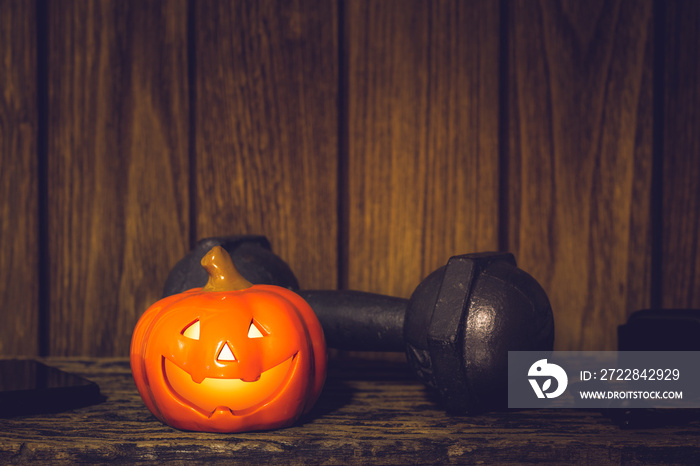 Happy Halloween festival background concept. Close up of Halloween head Pumpkins doll and the black 