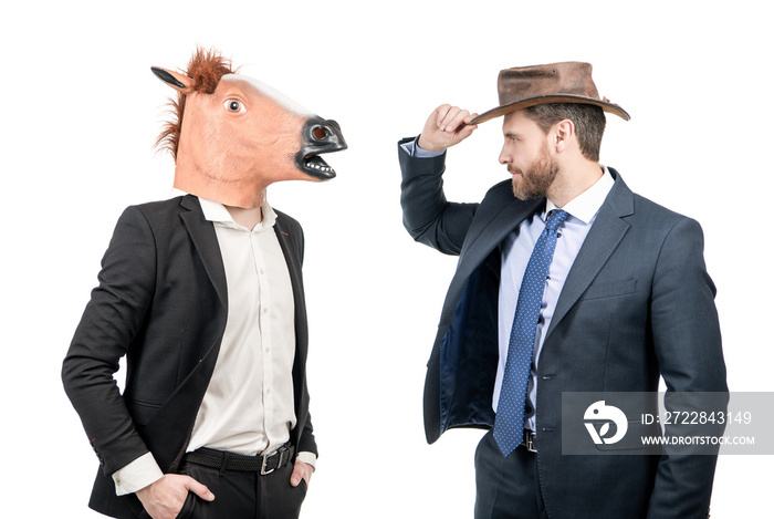 Cowboy man and businessman in horse head mask on costume party, corporate Halloween