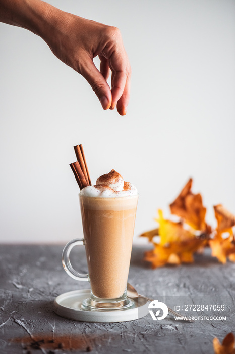 Spicy latte with pumpkin and whipped cream