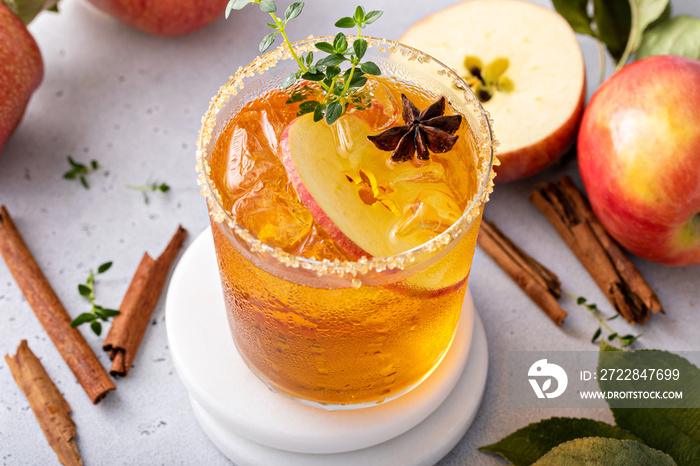 Apple cider margarita with brown sugar rim and fresh thyme