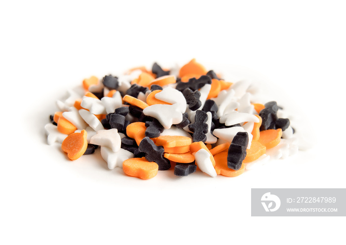 Pile of Halloween sprinkles with heart, ghosts and bat shapes, close up. Halloween themed sugar deco