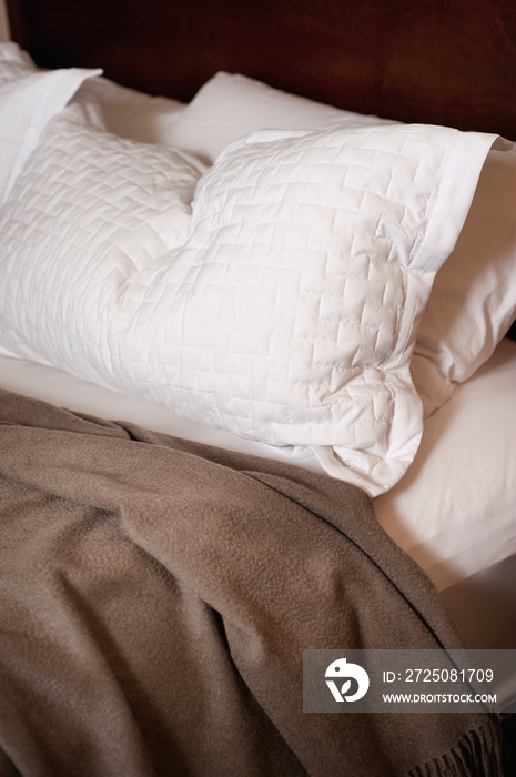 Close-up of pillows and bed sheet on bed at home; Scottsdale; USA