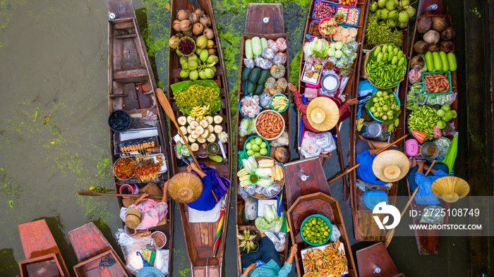 Aerial view famous floating market in Thailand, Damnoen Saduak floating market, Farmer go to sell or