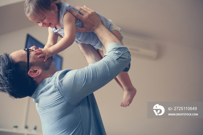 Single father with his baby girl.