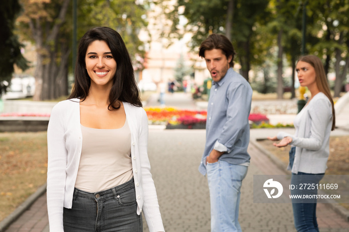 Man Being Distracted By Attractive Girl Walking With Girlfriend Outdoor