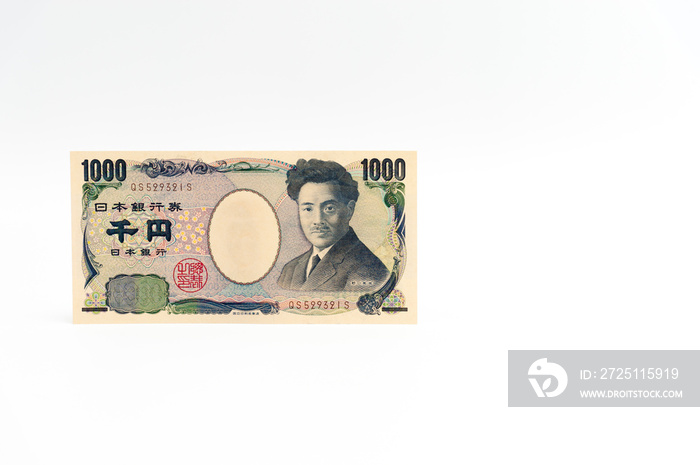 Yen - Japanese money in one thousand yen banknote isolated on white background with copy space. Hori